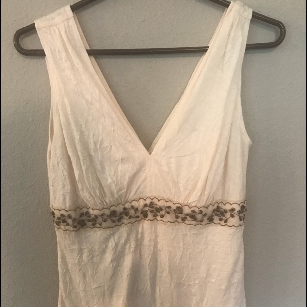 Off white with brown details top.